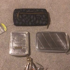 3 clutches/wristlets